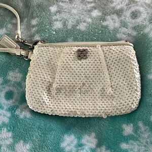 White sequin wristlet coach bag